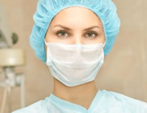 Pretty,Doctor,Woman,Portrait.,Ophthalmology,Laser,Microscope,Operation.,Clinic,Room.